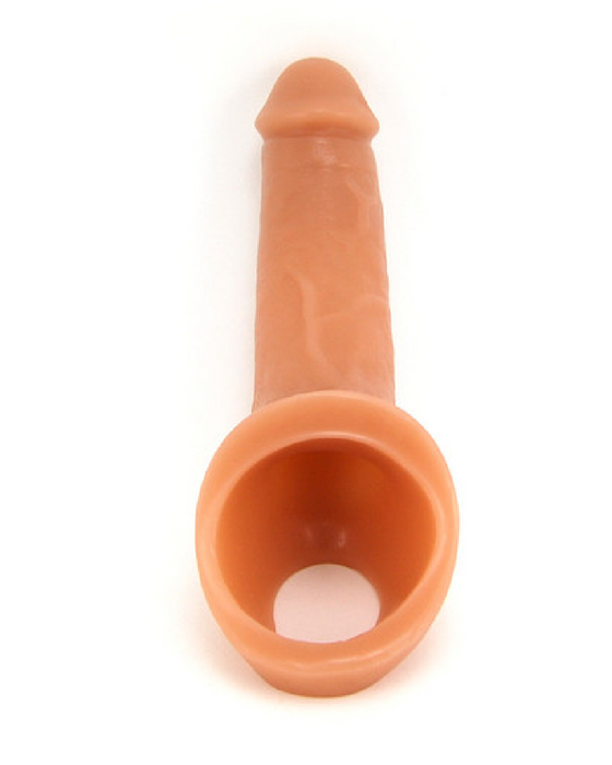 Vixen Ride On 6.25 Inch Silicone Penis Extension - Caramel looking down into the ball strap and entrance