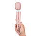 Le Wand Petite Rechargeable Massager - Rose Gold in hand