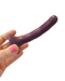 Please Slim Anal Silicone 5 Inch Dildo held in a hand